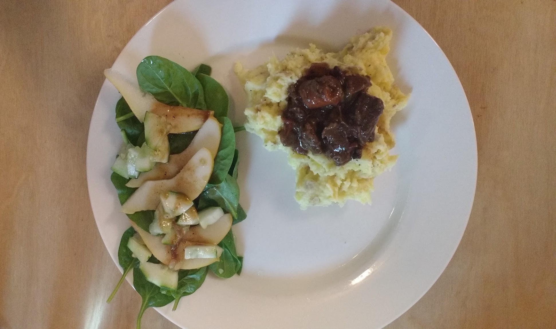 stew with salad